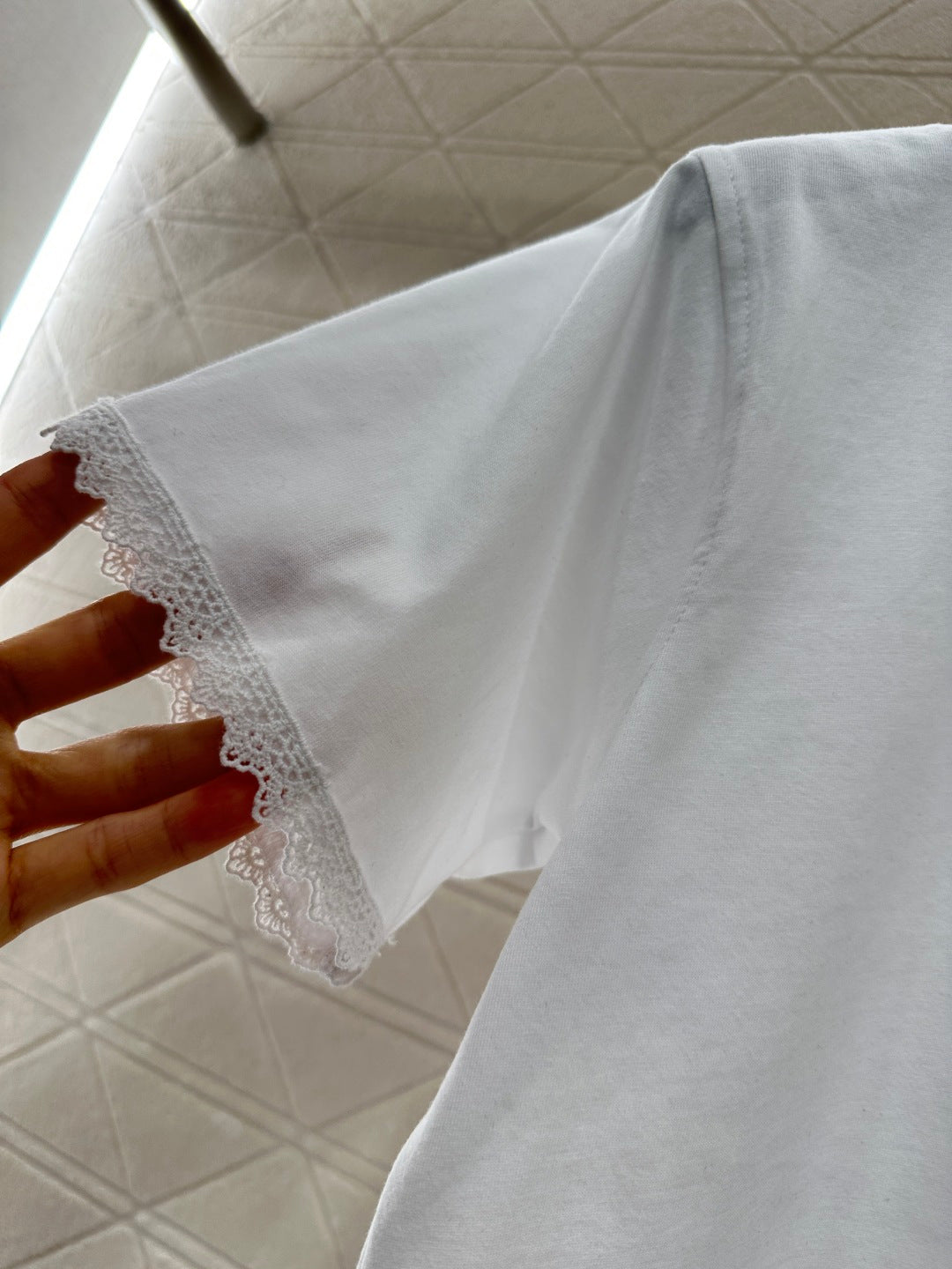 26NEW Hollow-out Embroidered Logo T-shirt