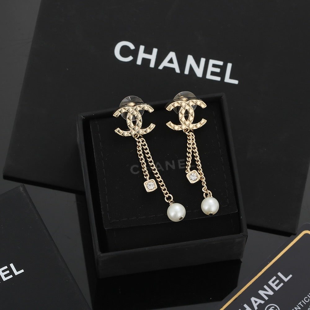 Long gold stud earrings