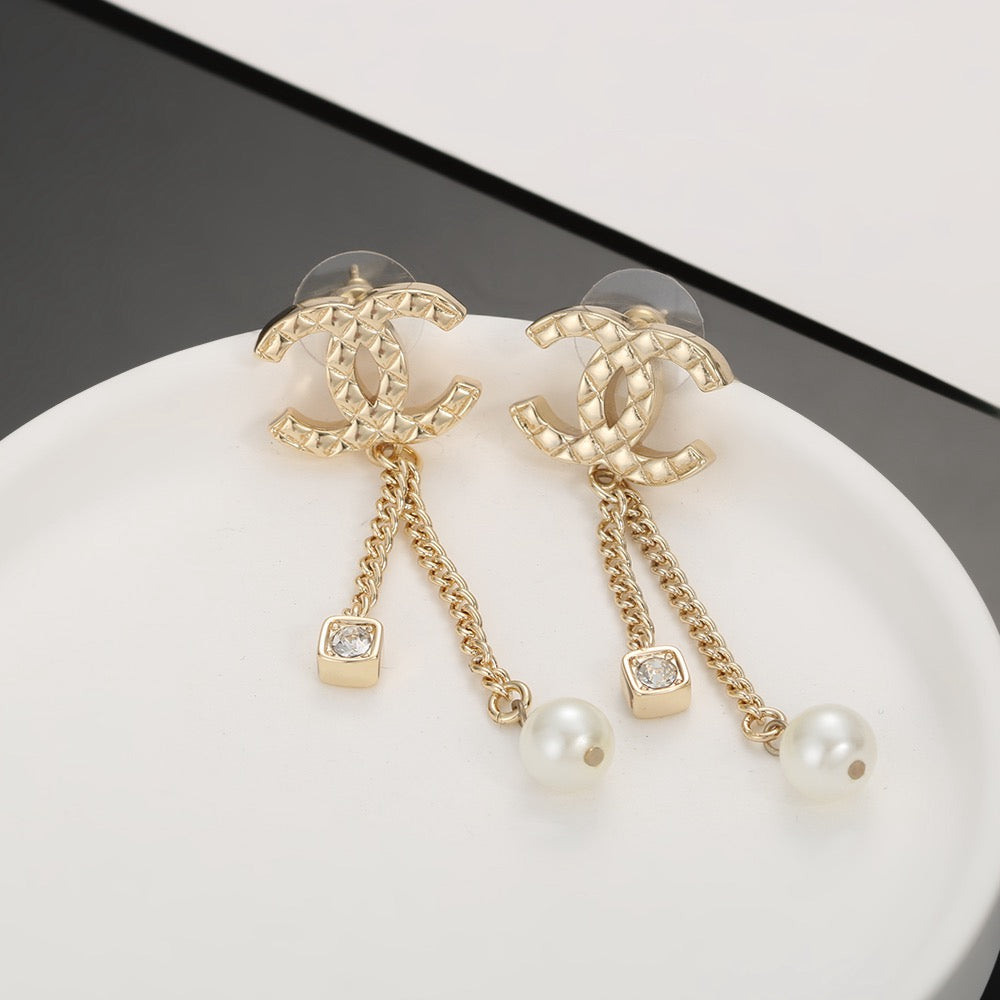 Long gold stud earrings