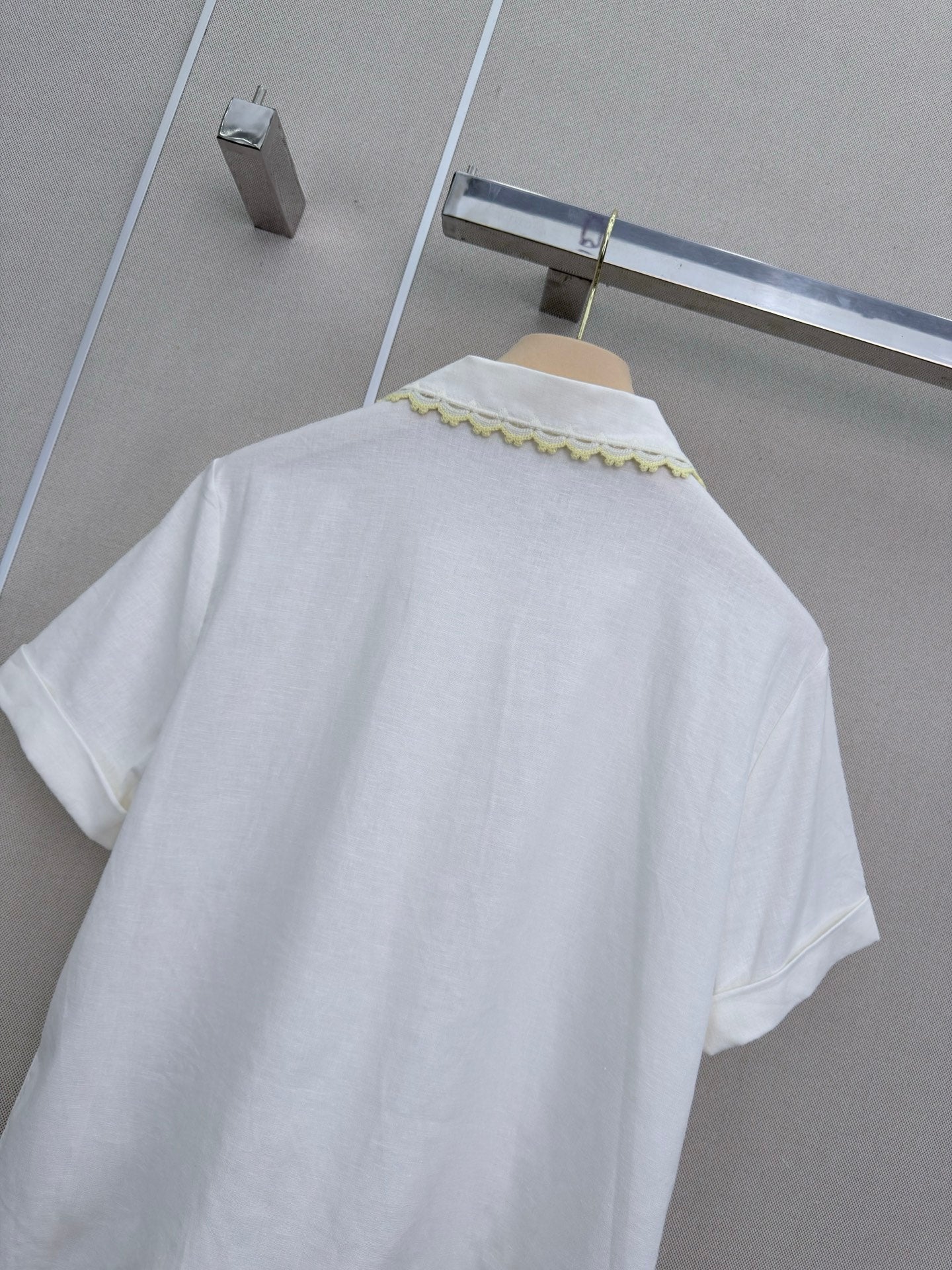 Lace-trimmed short white shirt