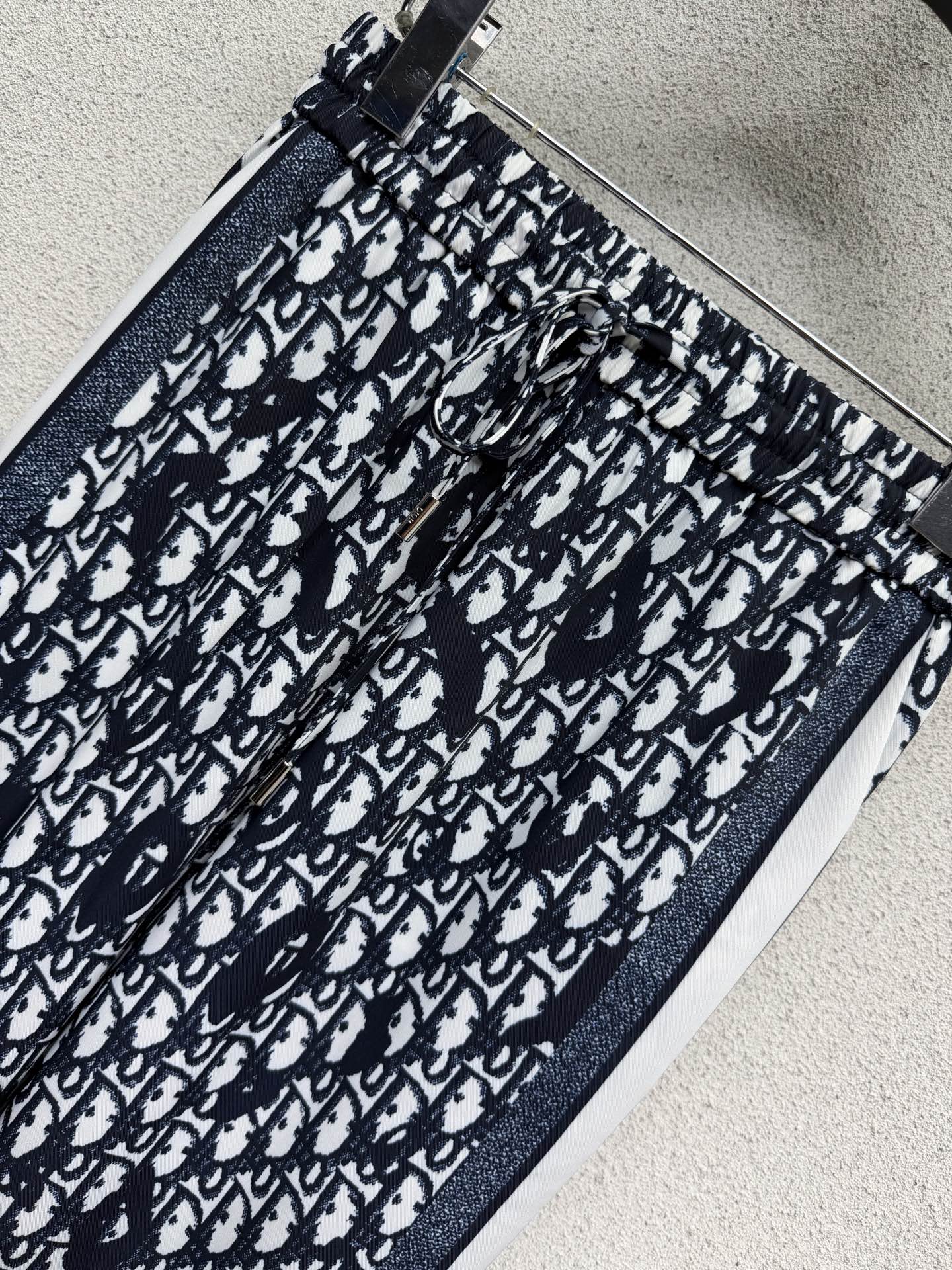 Elastic waist monogrammed trousers