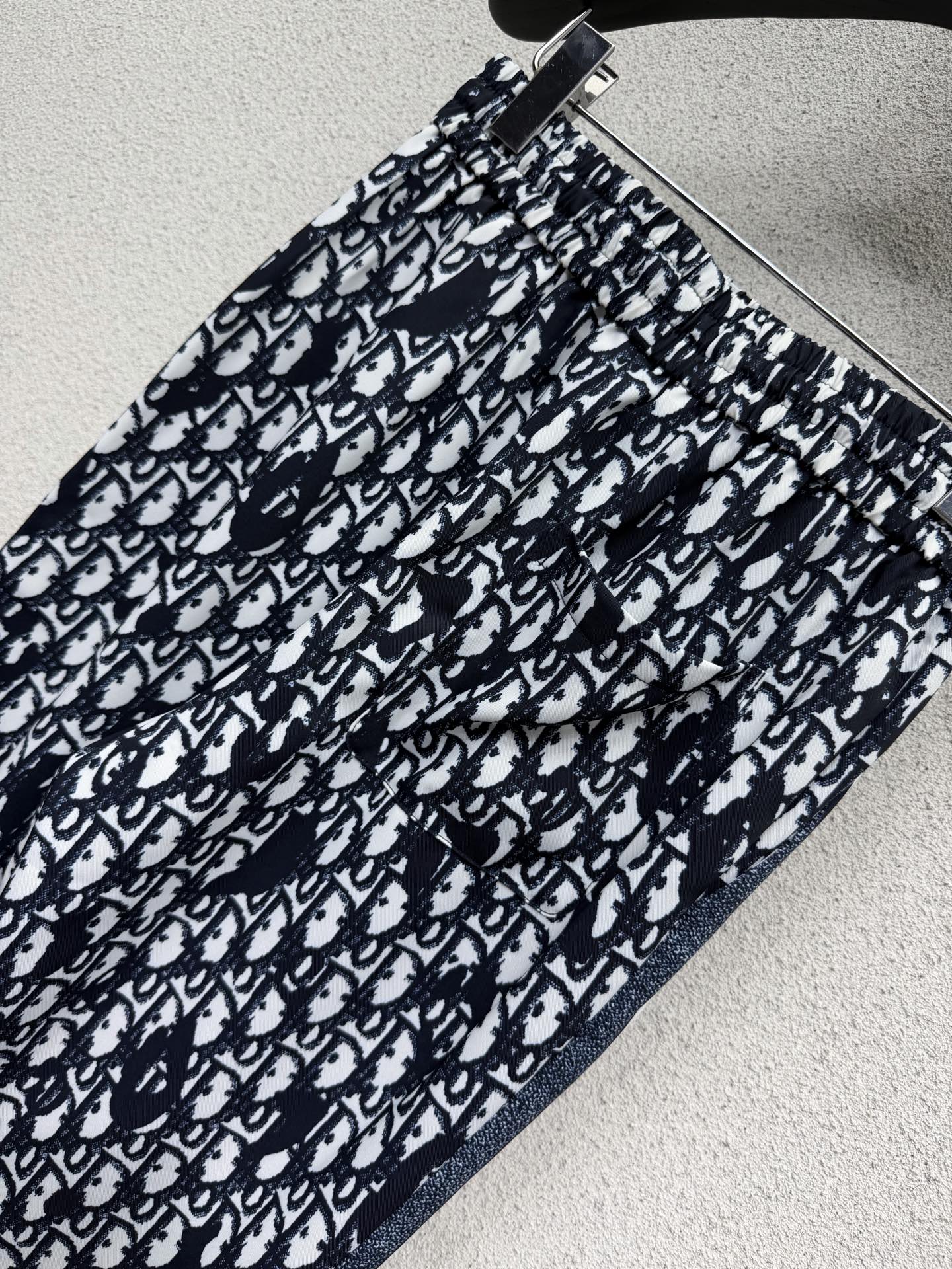 Elastic waist monogrammed trousers