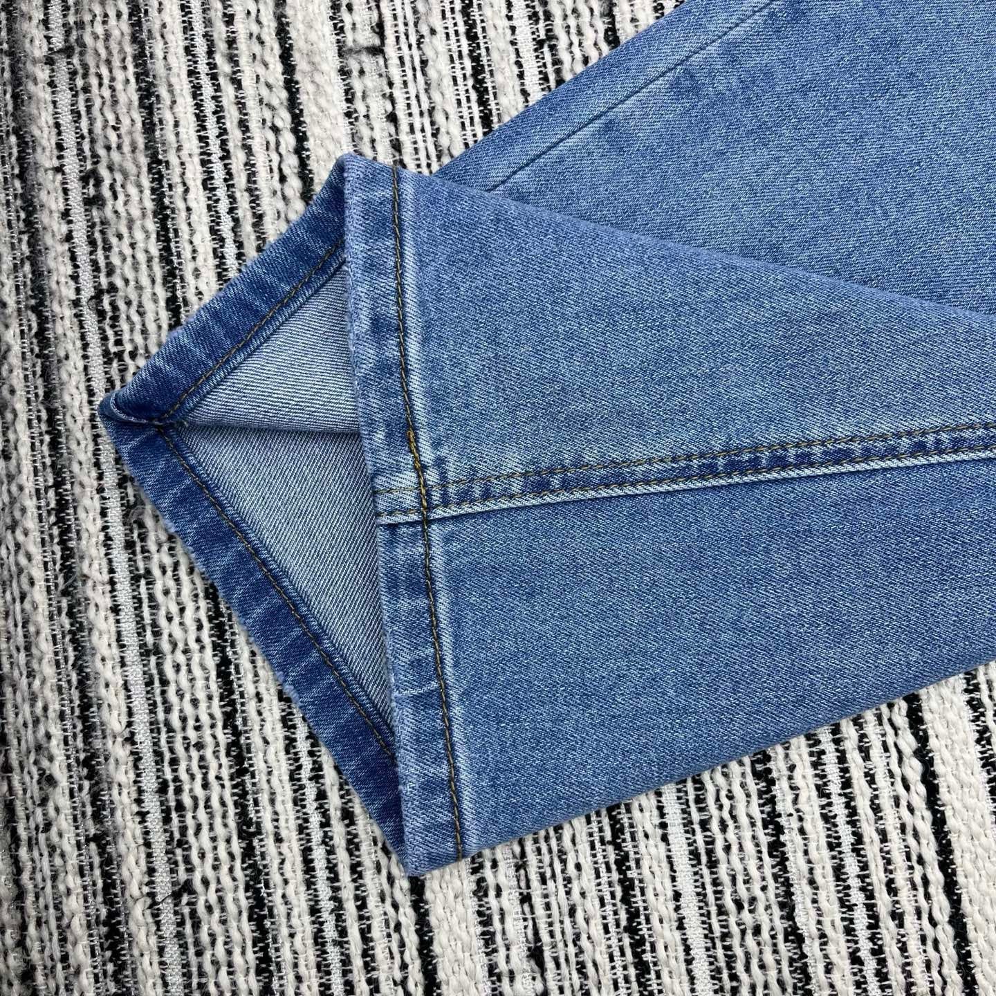 Spring 2026 Early Collection: New Straight-Leg Denim Jeans featuring Beaded Pockets, Embroidered Double-C Pocket Detail, and Washed Finish
