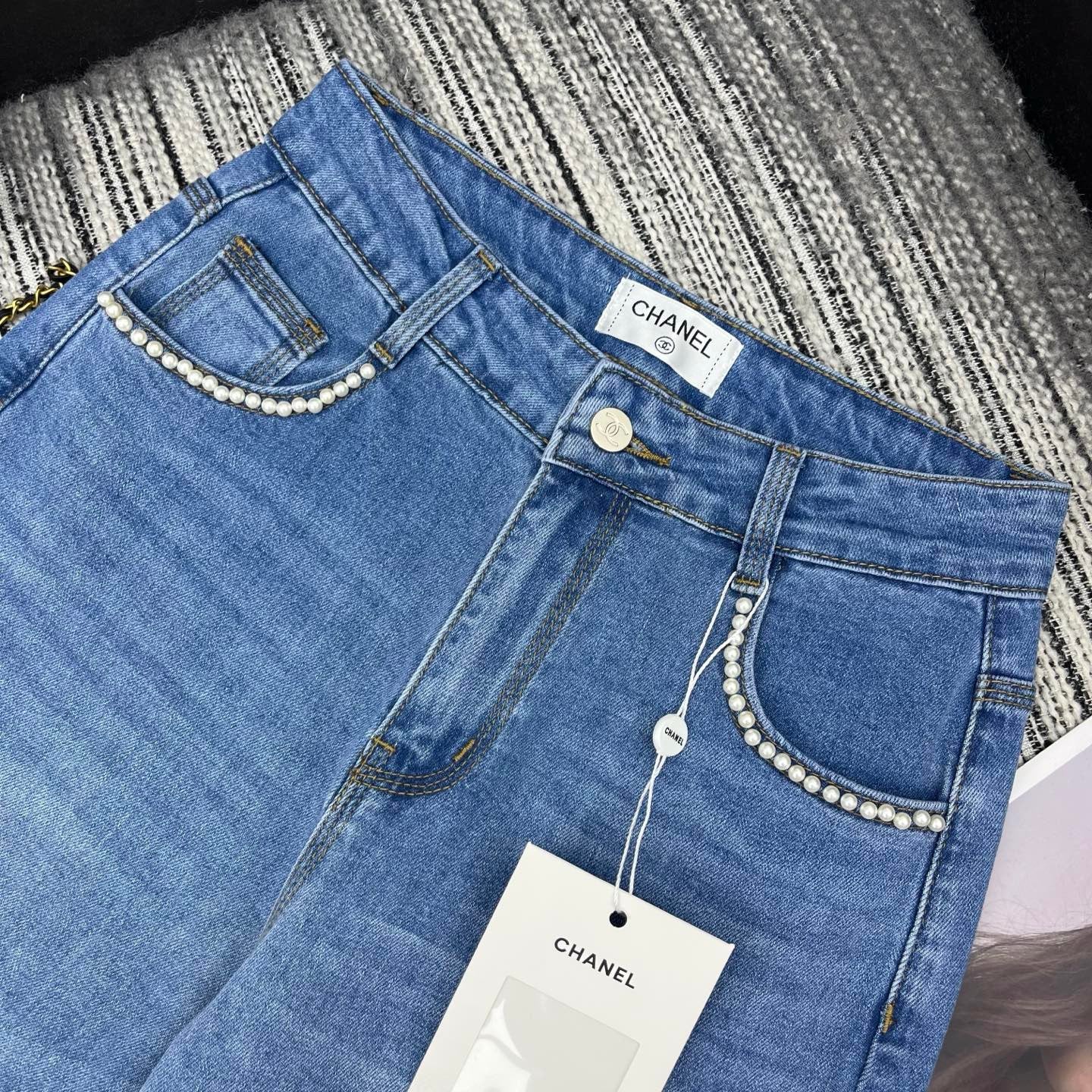Spring 2026 Early Collection: New Straight-Leg Denim Jeans featuring Beaded Pockets, Embroidered Double-C Pocket Detail, and Washed Finish