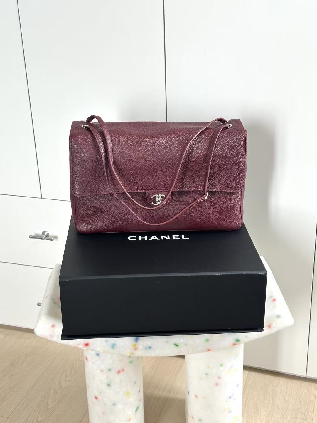 Flap bag (maroon with silver clasp)