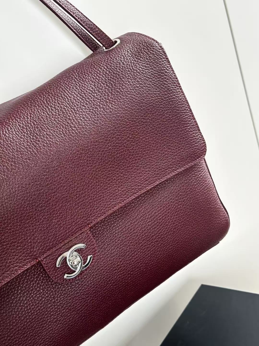 Flap bag (maroon with silver clasp)