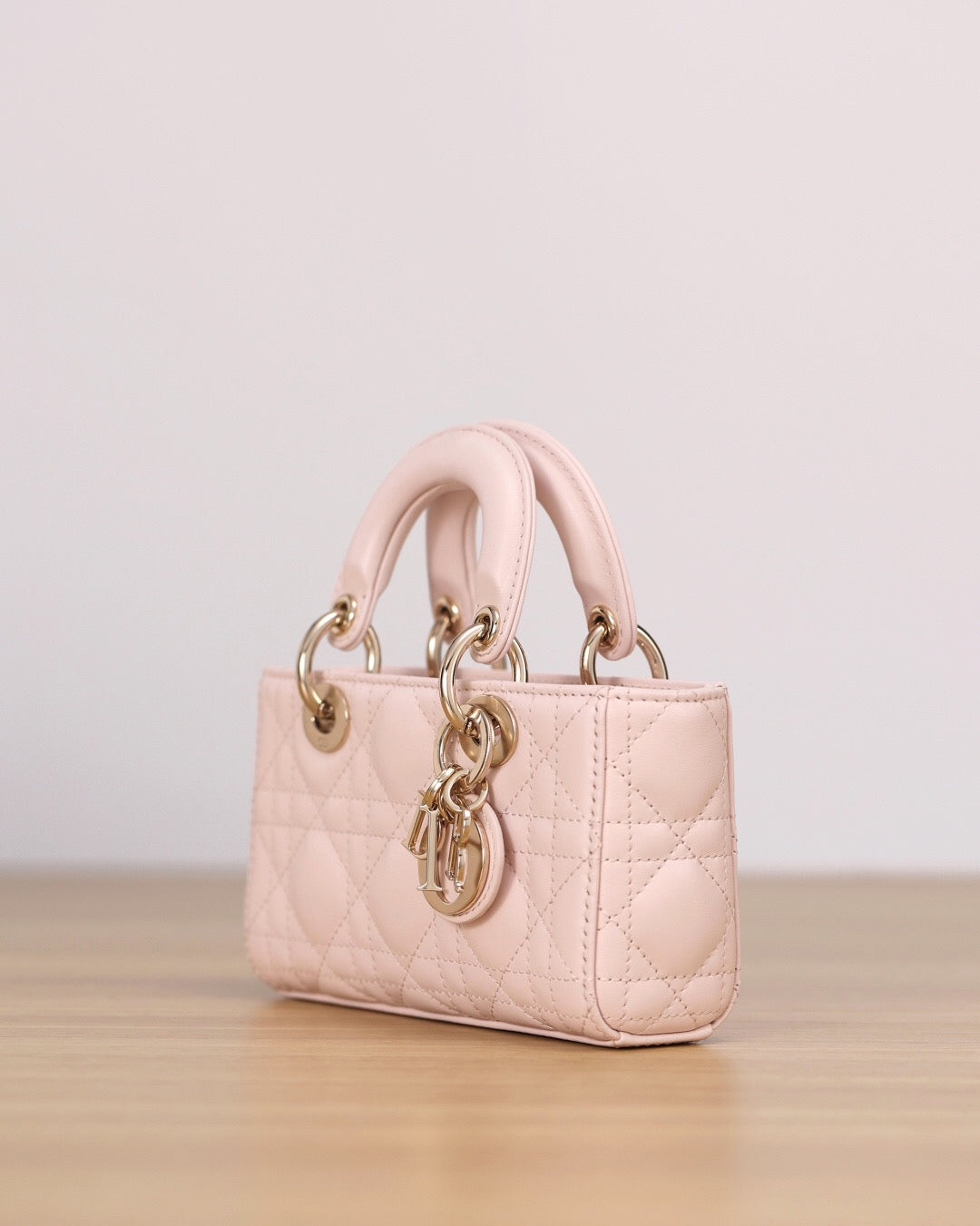 25FW NEW Pink Woven Leather Handbag
